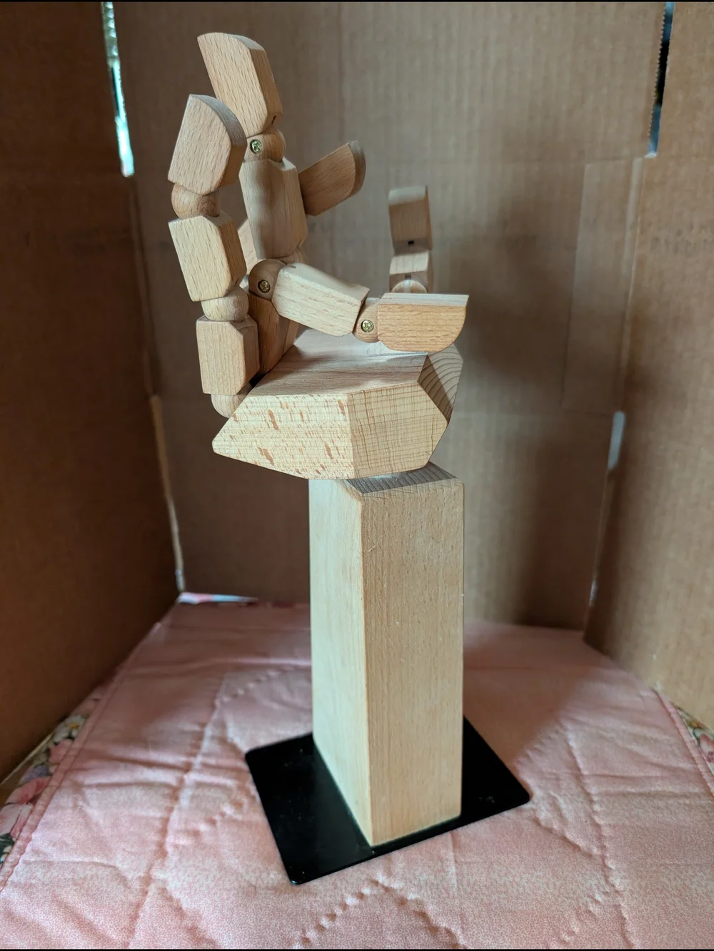 IKEA Natural Wood Articulated Hand Sculpture with Black Base